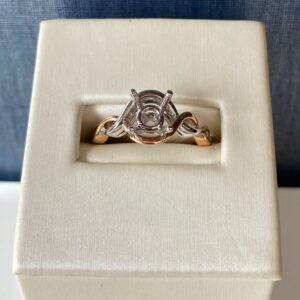Two Tone White and Rose Twisted Engagement Solitaire