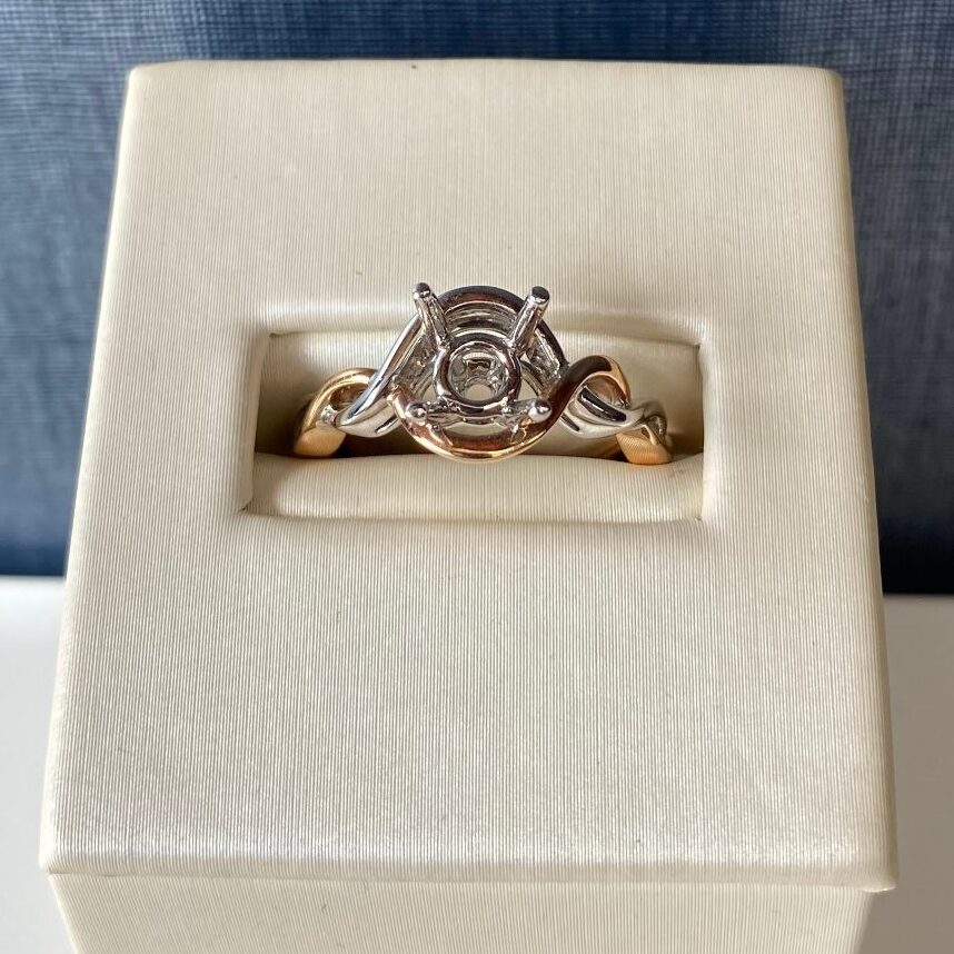 Two Tone White and Rose Twisted Engagement Solitaire