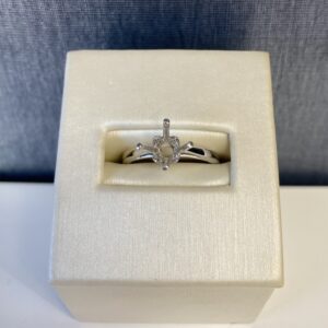 White Gold Engagement Ring with Four Hidden Diamonds