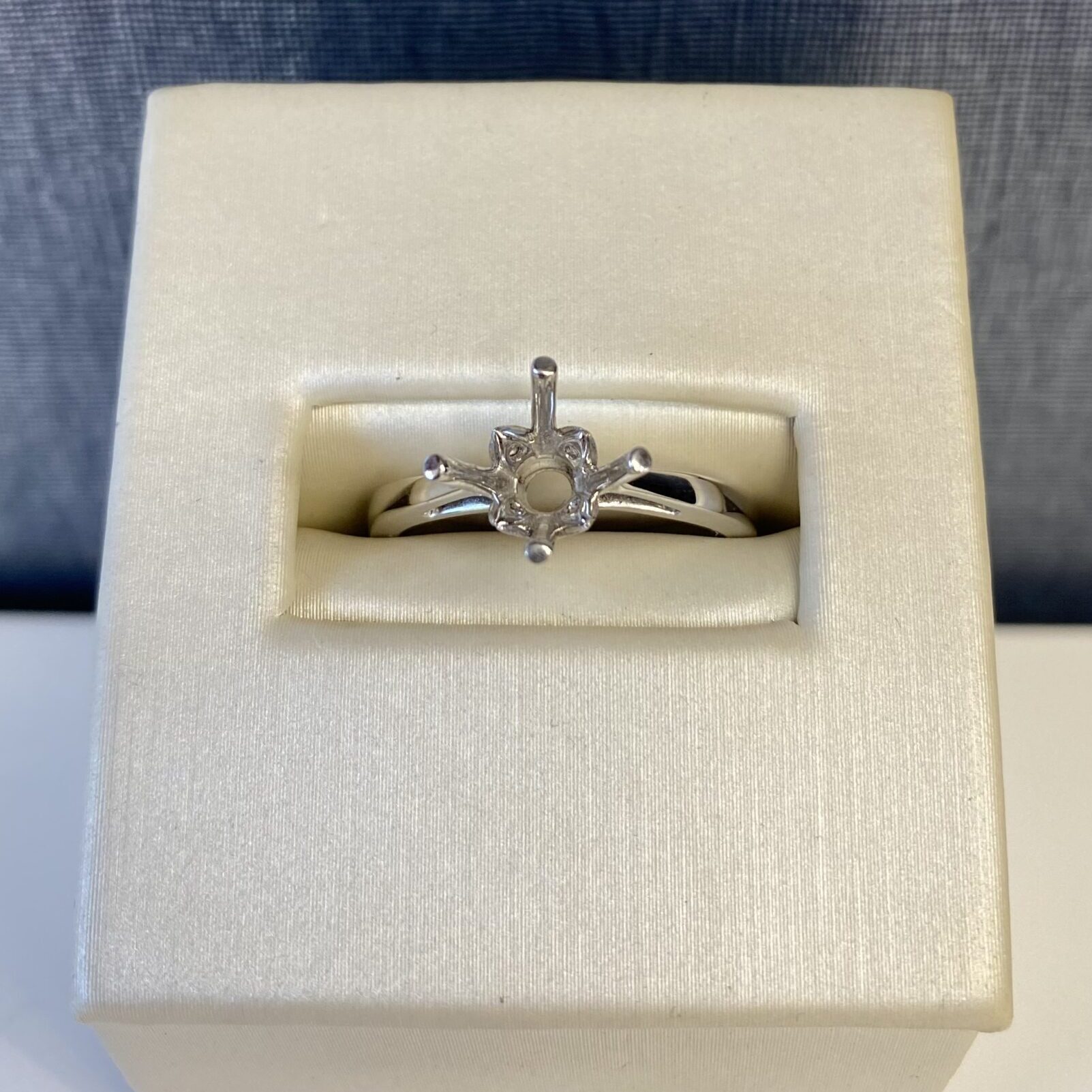 White Gold Engagement Ring with Four Hidden Diamonds