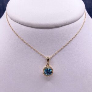 Blue Zircon and Diamond Pendant in Yellow