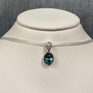 Blue Zircon and Diamond Pendant