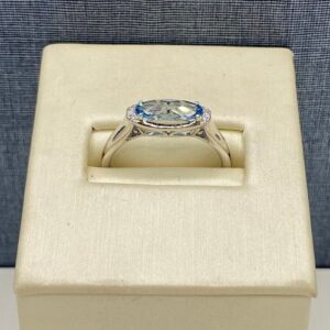 Blue Topaz and Diamond Ring in White Gold