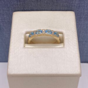 Blue Topaz and Diamond Ring in Yellow Gold with Milgrain Detail