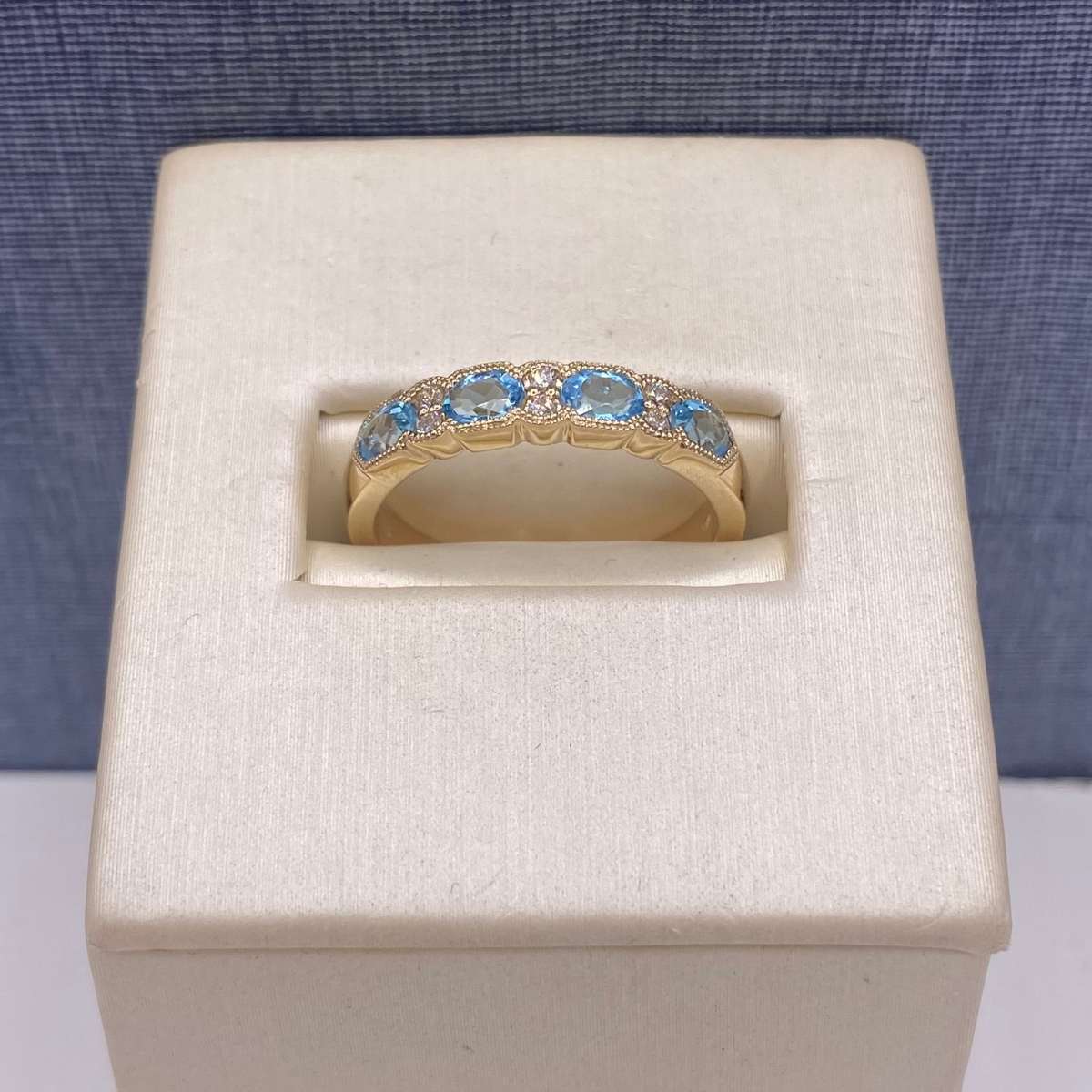Blue Topaz and Diamond Ring in Yellow Gold with Milgrain Detail