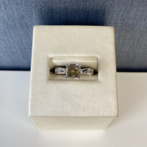 Graduated Diamond and White Gold Engagement Ring