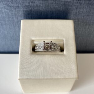White Gold and Graduated Diamond Engagement Ring