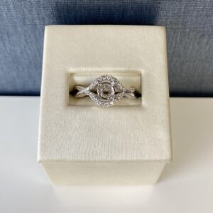 Diamond and White Gold Wave Engagement Ring