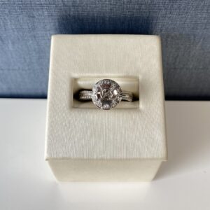 Gold and Diamond Halo Engagement Ring in White Gold