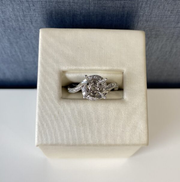 White Gold and Diamond Swirled Engagement Ring