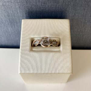 White Diamond Engagement Ring Wrapped in Rose Gold