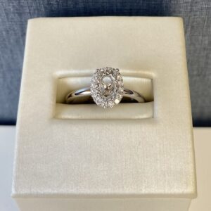 White Gold Oval Engagement Ring with Diamond Halo