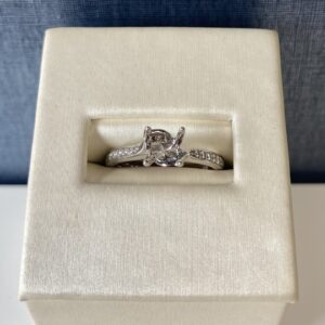 White Gold and Graduated Diamond Engagement Ring