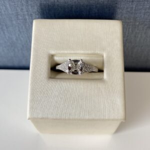 White Gold and Diamond Engagement Ring with Miligrain Detail