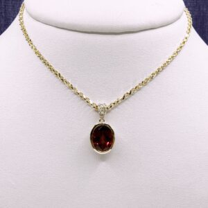 Bezel Set Garnet Necklace in Yellow Gold
