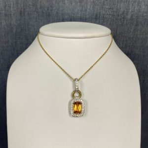 Garnet and Diamond Yellow and White Gold Necklace