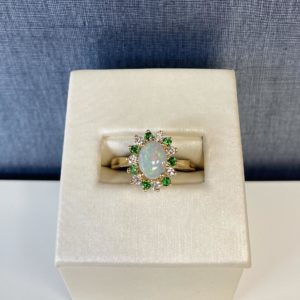 Opal with Tsavorite and Diamond Halo in 14k Yellow Gold
