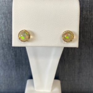 Opal studs with Diamond Halos in 14k Yellow Gold