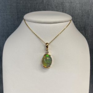 Opal Pendant with Diamond in 14k Yellow Gold