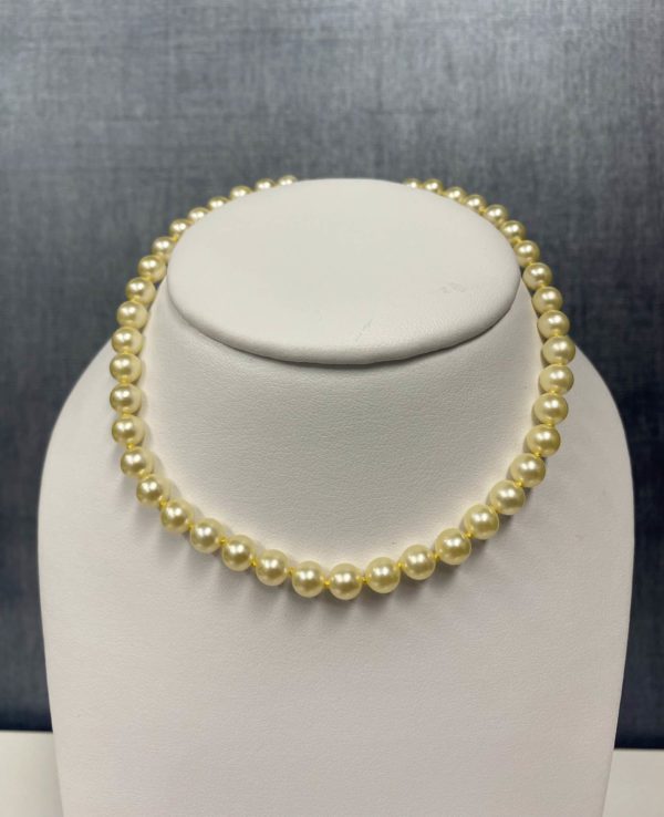 Strand of 5mm Pearls in 14k Yellow Gold