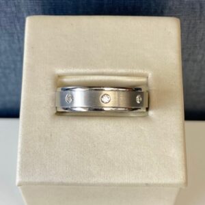 Platinum Ring with Diamonds and Brushed Finish Center