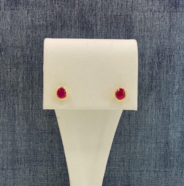 Rubies Bezel Set in Yellow Gold