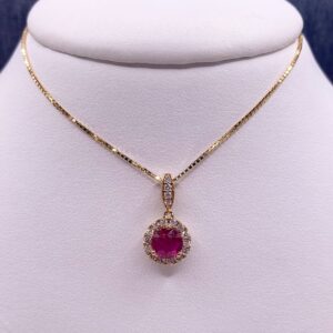 Ruby Pendant in Yellow Gold with Diamond Halo