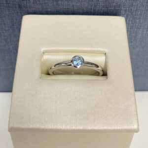 Blue Topaz and White Gold Ring